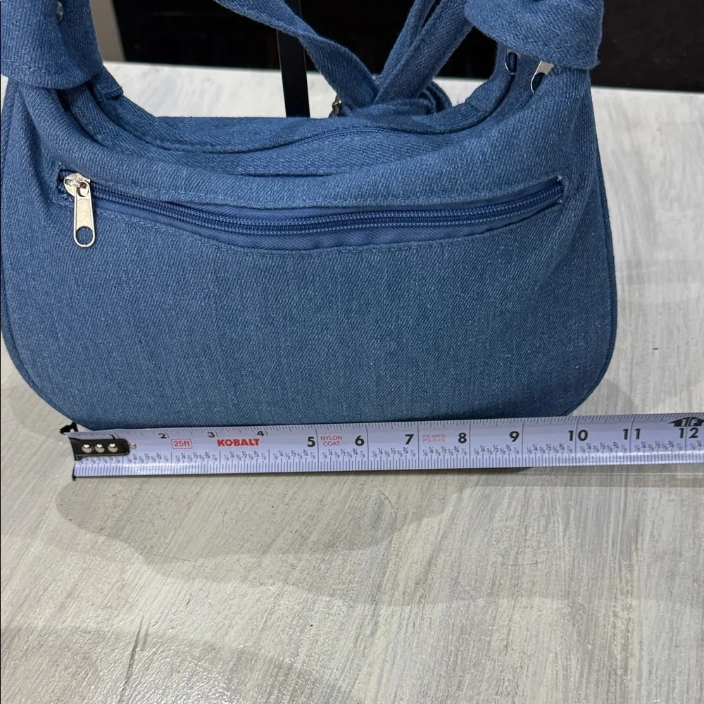 Chic Blue Denim Hobo Bag with Floral Accents